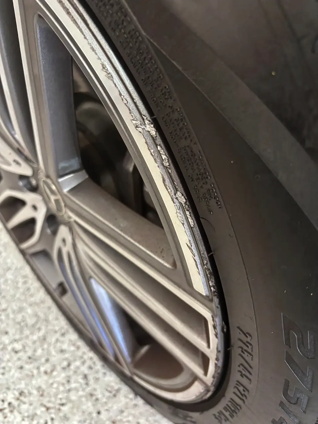 Mobile Wheel Repair Anaheim Mercedes-Benz wheel with curb rash before repair
